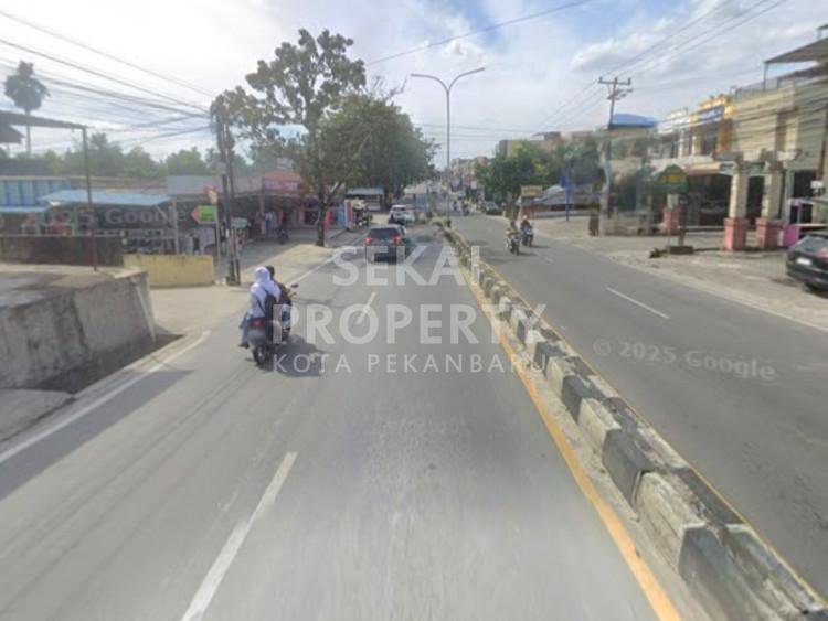 DISEWAKAN SEBIDANG TANAH KERAS LOKASI TEPI JALAN KAHARUDDIN NST - PEKANBARU