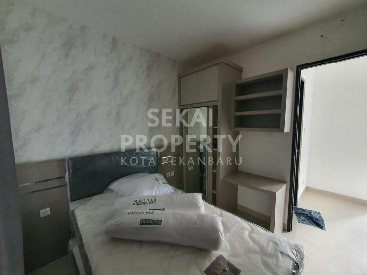 DIJUAL RUMAH CLUSTER 2 LT SEMI FURNISHED SIAP HUNI DI JL PERKASA - PEKANBARU