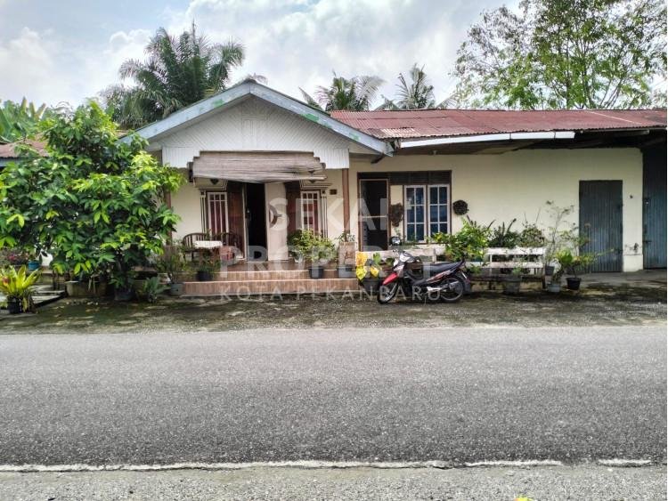 DI JUAL TANAH BESERTA BANGUNAN DI JALAN KARYA BAKTI