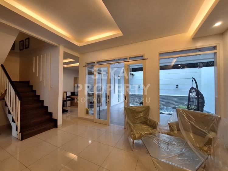 DISEWAKAN RUMAH CLUSTER ELITE 2 LT FULL FURNISH LOKASI SUDIRMAN-PEKANBARU