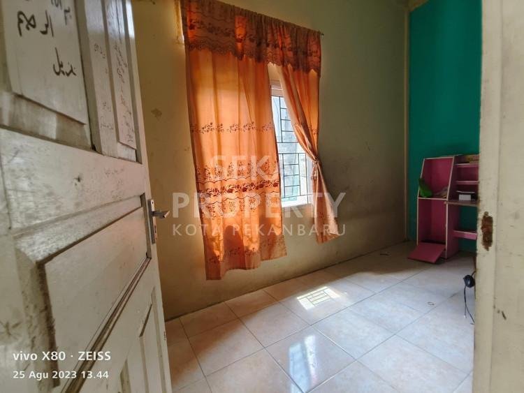 DIJUAL RUMAH DI DEKAT JALAN UTAMA PEKANBARU